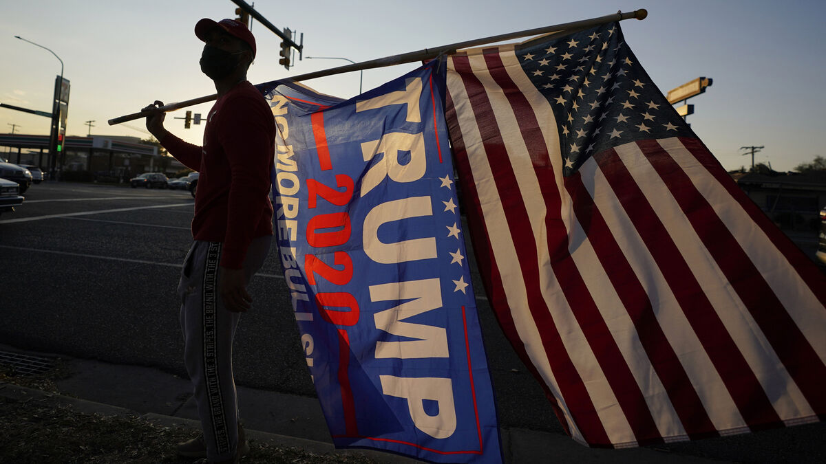 Trump supporters gather near the Salt Lake County Government Center Tuesday, Nov. 3, 2020, in Salt Lake City. Picture: AP Photo/Rick Bowmer