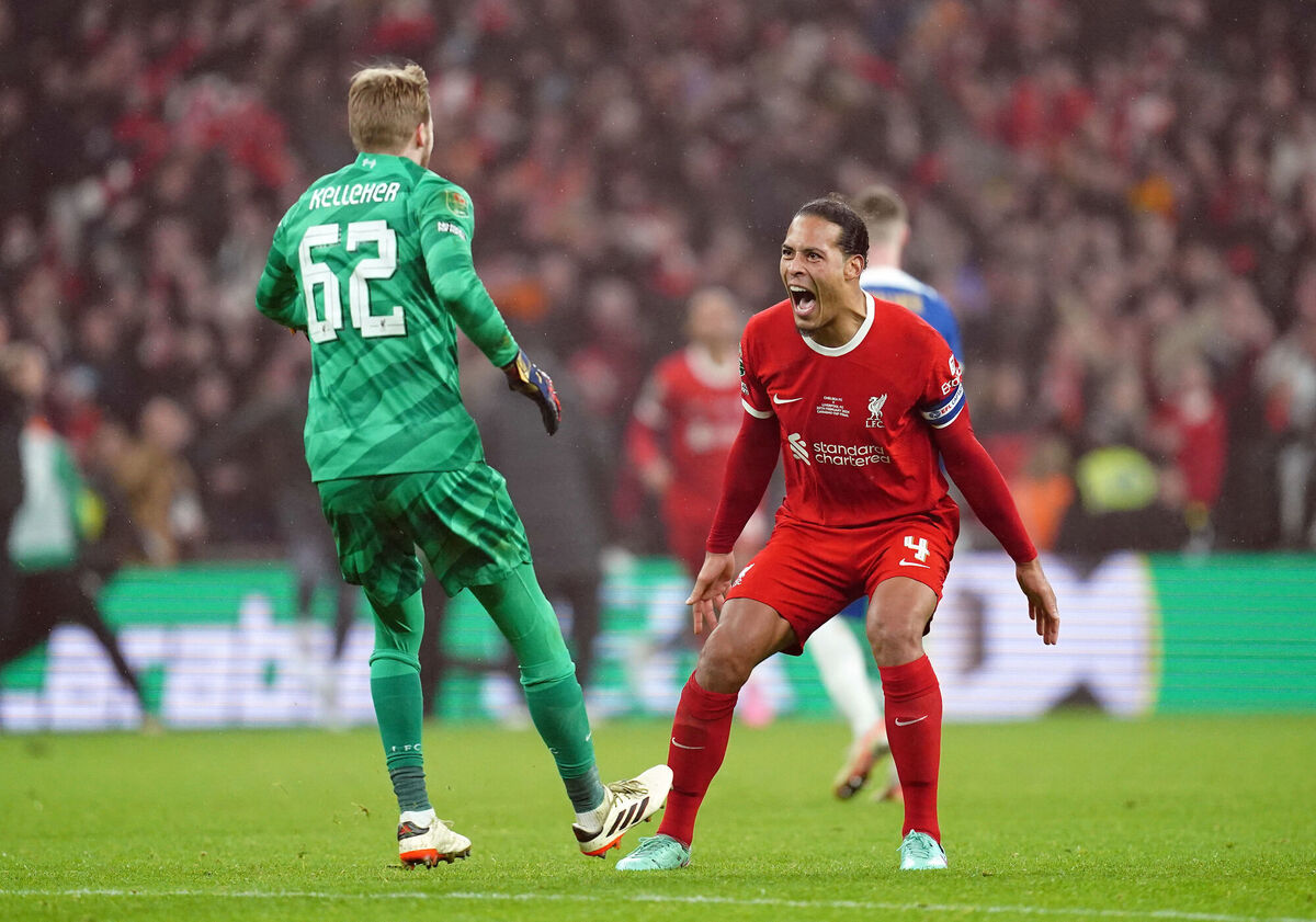 Liverpool goalkeeper Caoimhin Kelleher and Virgil van Dijk celebrate after the final whistle of the Carabao Cup final. Picture: Nick Potts/PA Wire. Liverpool goalkeeper Caoimhin Kelleher and Virgil van Dijk celebrate after the final whistle of the Carabao Cup final. Picture: Nick Potts/PA Wire.