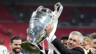 <p>Real Madrid manager Carlo Ancelotti celebrates with the trophy after winning the UEFA Champions League final at Wembley Stadium in London. Picture date: Saturday June 1, 2024.</p>