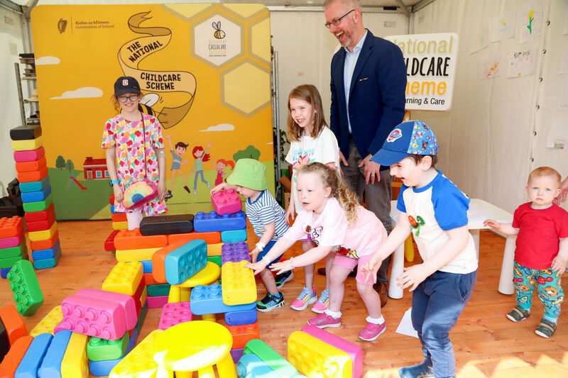 Children’s Minister Roderic O’Gorman with Róisin, Odhran, Chloe, Béibhinn, Cairbre, and Aodhán who were enjoying the ‘Budding Bloomers’ section of Bord Bia Bloom. During his visit to Bloom, Mr O'Gorman welcomed new data showing a new record of 150,000 children are now benefitting from the National Childcare Scheme. Picture: Maxwells Children’s Minister Roderic O’Gorman with Róisin, Odhran, Chloe, Béibhinn, Cairbre, and Aodhán who were enjoying the ‘Budding Bloomers’ section of Bord Bia Bloom. During his visit to Bloom, Mr O'Gorman welcomed new data showing a new record of 150,000 children are now benefitting from the National Childcare Scheme. Picture: Maxwells