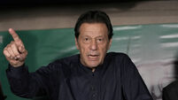 Imran Khan acquitted of leaking state secrets but remains in prison