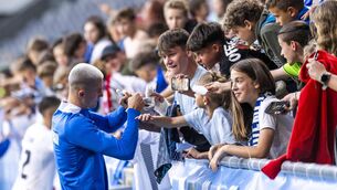 <p>SIGN HIM UP: Slovenia's Benjamin Sesko greets the fans after their game this week against Armenia in Ljubljana. Pic: Jurij Kodrun/Getty Images</p>