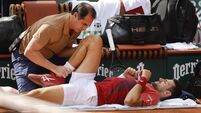 Novak Djokovic forced to withdraw from French Open with knee injury