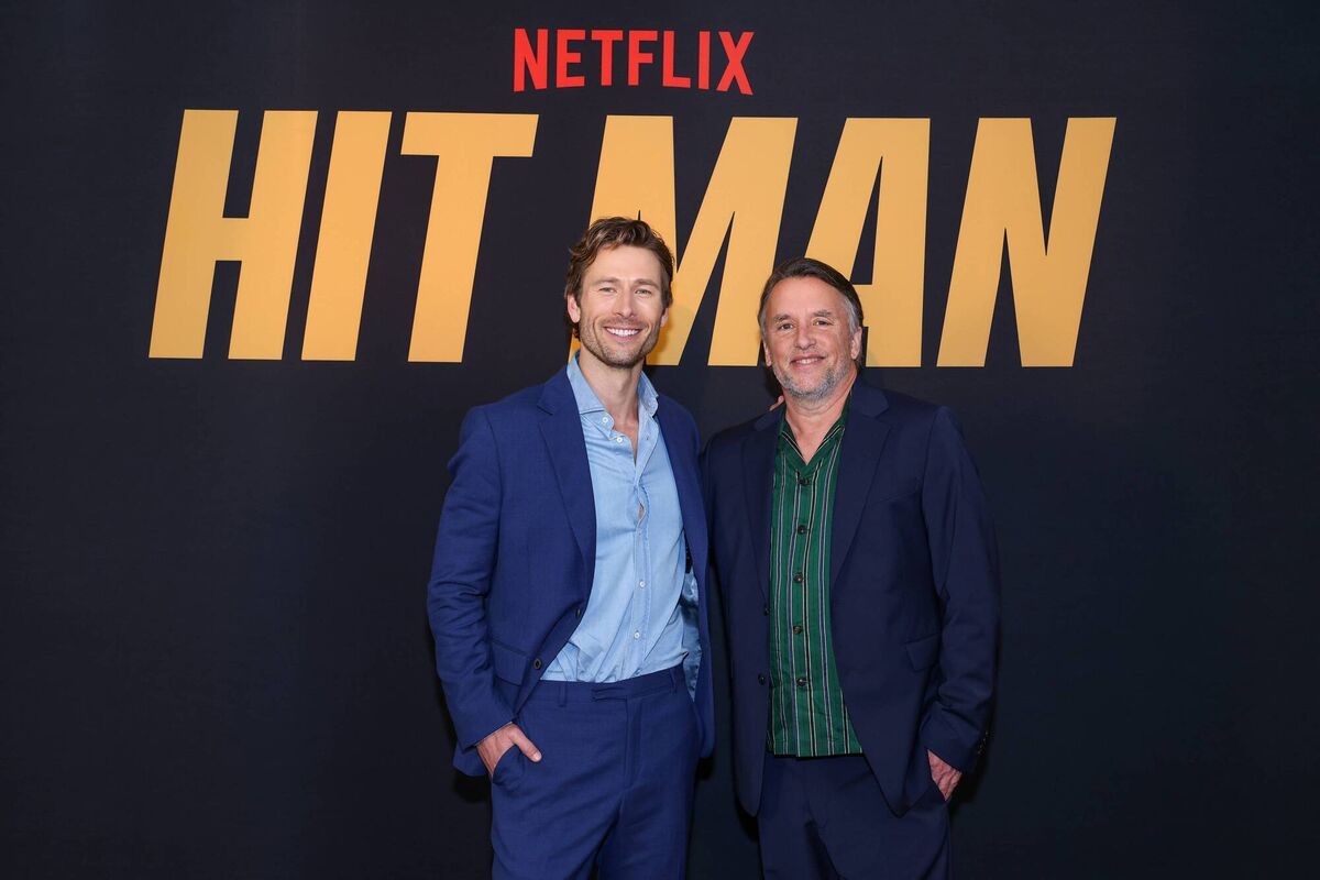 Glen Powell and Richard Linklater attend a photo call celebrating Netflix's new film "Hit Man" at Four Seasons Hotel on May 17, 2024 in Austin, Texas. (Photo by Rick Kern/Getty Images for Netflix)
