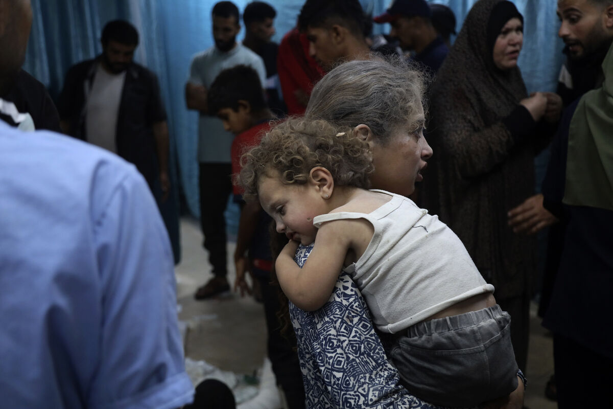 Palestinian children wounded in the Israeli bombardment of a residential building in Bureij refugee camp being brought to al-Aqsa Martyrs hospital in central Gaza on Tuesday. Photo: AP/Saher Alghorra
