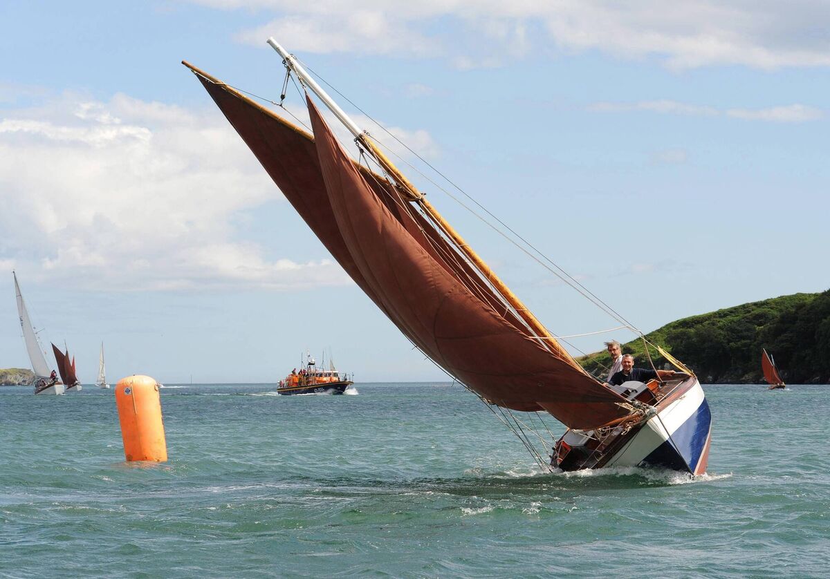 Making waves: actor Jeremy Irons at the Helm of "Willing Lass" during the 2013 Classic Boat regatta in Glandore. Picture: Zach Barker