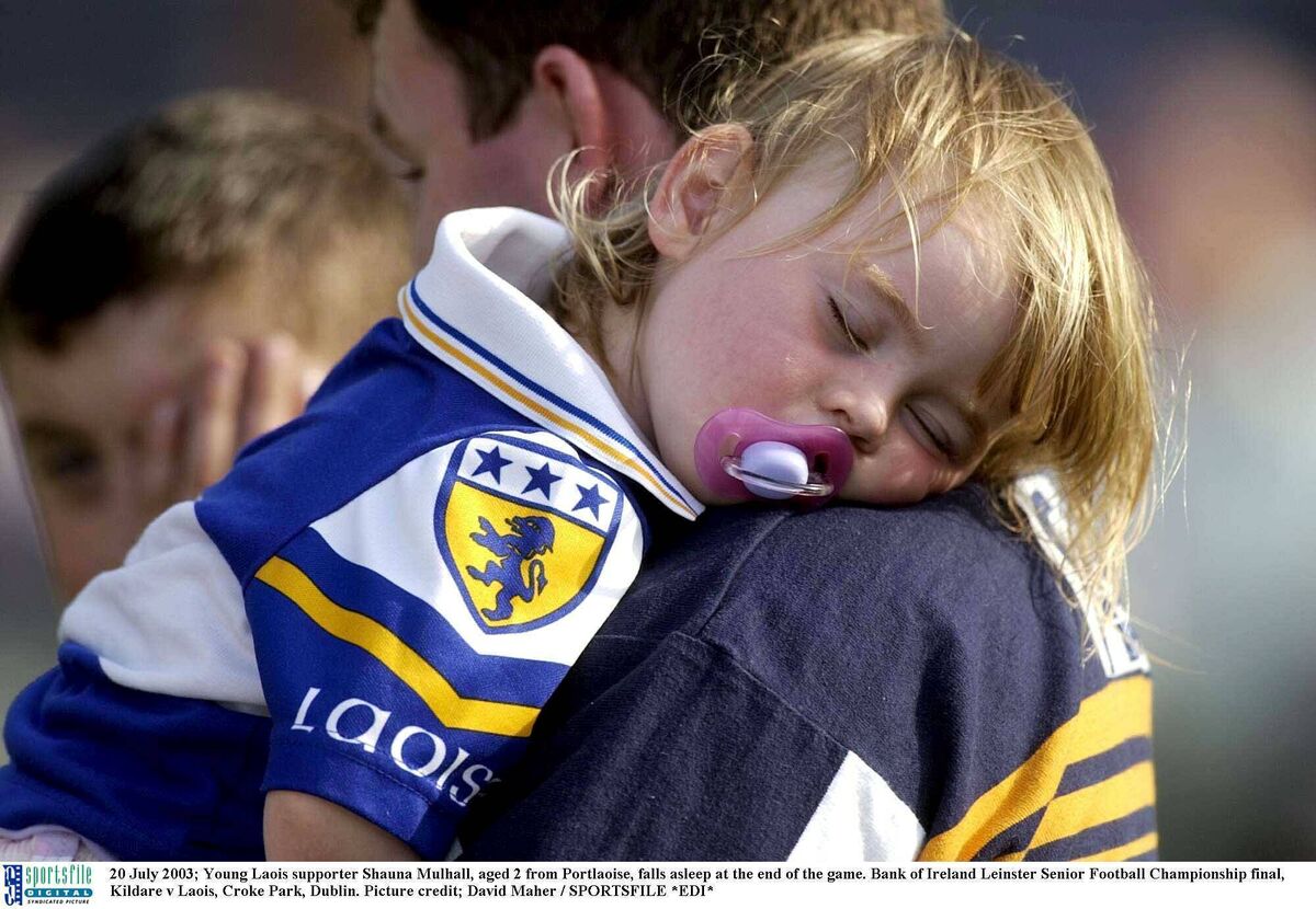 Snoozing: A young Laois supporter grabs forty winks. Pic: Dave Maher, Sportsfile