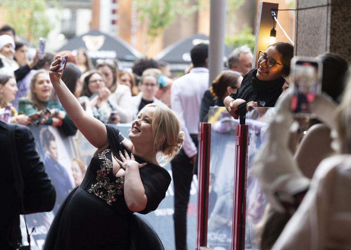 Nicola Coughlan posing for a selfie on the red carpet. Picure: Sam Boal/Collins Photos Nicola Coughlan posing for a selfie on the red carpet. Picure: Sam Boal/Collins Photos