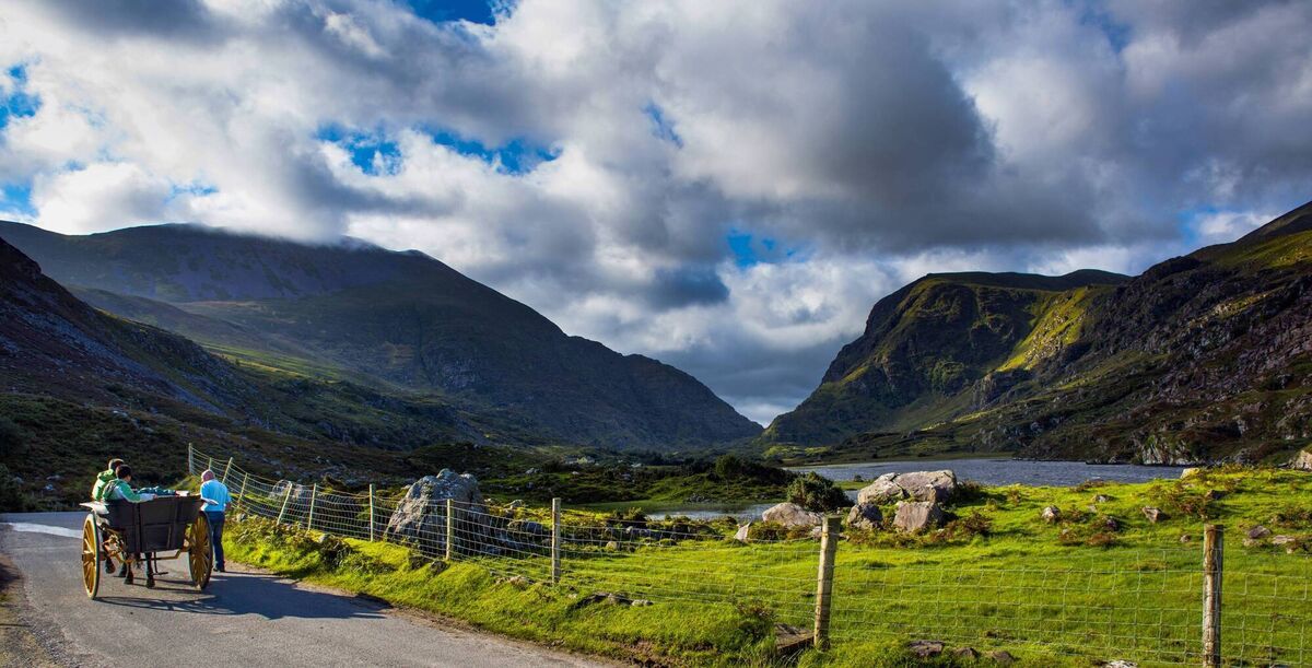 A pony and trap travel through the Gap of Dunloe, Killarney National Park, County Kerry