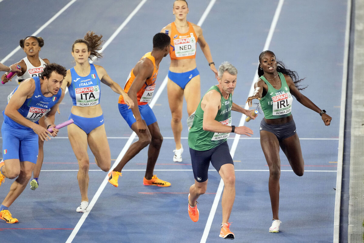 ORANJE CRUSHED: Rhasidat Adeleke, of Ireland, hands the baton to teammate Thomas Barr with Ireland's Dutch rivals left in the distance after the key battle of the race. Pic: AP Photo/Gregorio Borgia ORANJE CRUSHED: Rhasidat Adeleke, of Ireland, hands the baton to teammate Thomas Barr with Ireland's Dutch rivals left in the distance after the key battle of the race. Pic: AP Photo/Gregorio Borgia