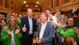 <p> Tánaiste Micheál Martin with Cllr Tony Fitzgerald as his re-election is announced at Cork City Hall on Saturday. Picture: Larry Cummins</p>