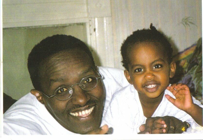 Katia Mia as a child, with her dad.