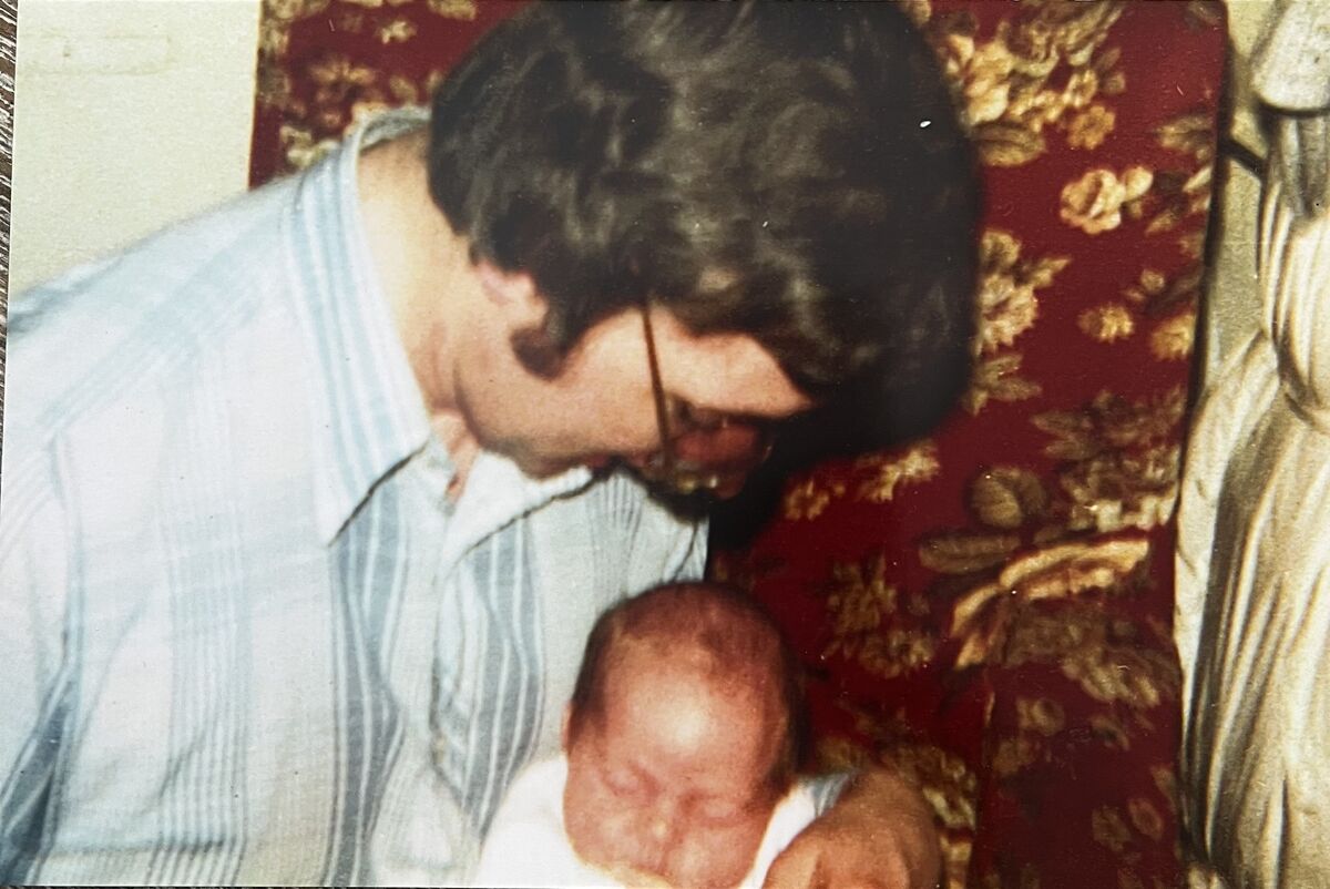 Jo Spain with her father as a baby.