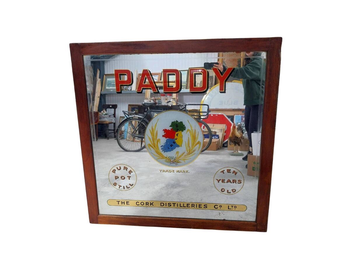 A rare early 20th-century Cork Distilleries advertising mirror at Victor Mee.