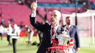 <p>STAYING PUT: Manchester United manager Erik ten Hag celebrates after winning the Emirates FA Cup final at Wembley.</p>