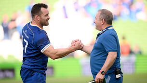 <p>8 June 2024; Ulster head coach Richie Murphy, right, and Cian Healy of Leinster. Photo by Ramsey Cardy/Sportsfile</p>