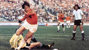 <p>ON A STRING: The wonderful Johan Cruyff dribbles past Argentinian keeper Daniel Carnevali on his way to scoring the first of two during the 1974 World Cup clash in Gelsenkirchen.</p>