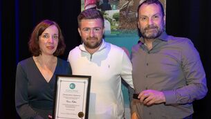 <p>Ciarán Fullam (centre) with Coolmine CEO Pauline McKeown (left) and Conor Kearney of CJK Engineering. Ciarán is working with CJK Engineering, a pathway-to-work partner of Coolmine, where he has completed several construction courses.</p>