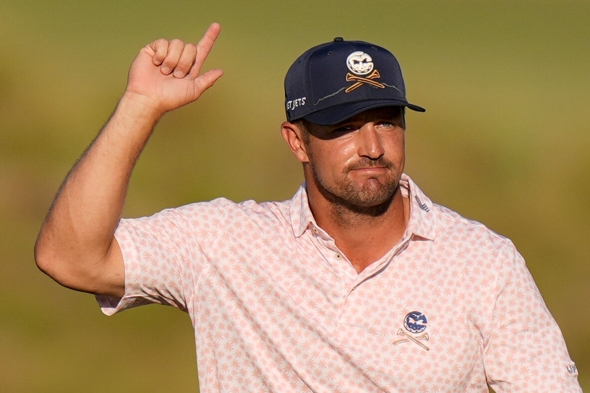 LEADING WAY: Bryson DeChambeau walks to the green on the 13th hole during the third round of the U.S. Open in Pinehurst, N.C. (AP Photo/Frank Franklin II)