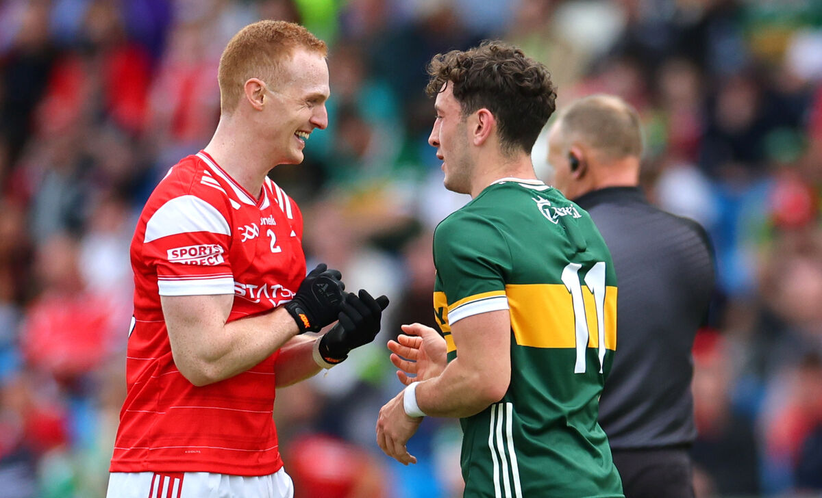 Louth’s Donal McKenny and Paudie Clifford of Kerry share a joke. Picture: ©INPHO/James Crombie