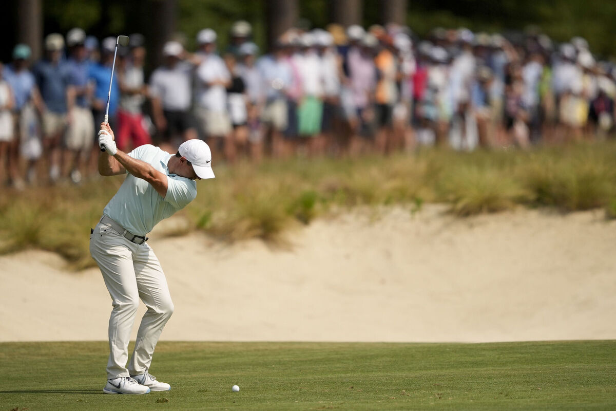 Rory McIlroy, of Northern Ireland, hits from the fairway on the 10th hole. Pic: Matt York