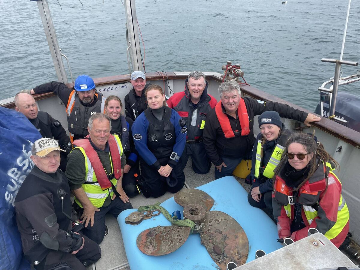 Members of the team who helped recover the propeller.