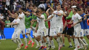 <p>SHOCK WIN: Slovakia players celebrate after a Group E match. AP Photo/Michael Probst.</p>