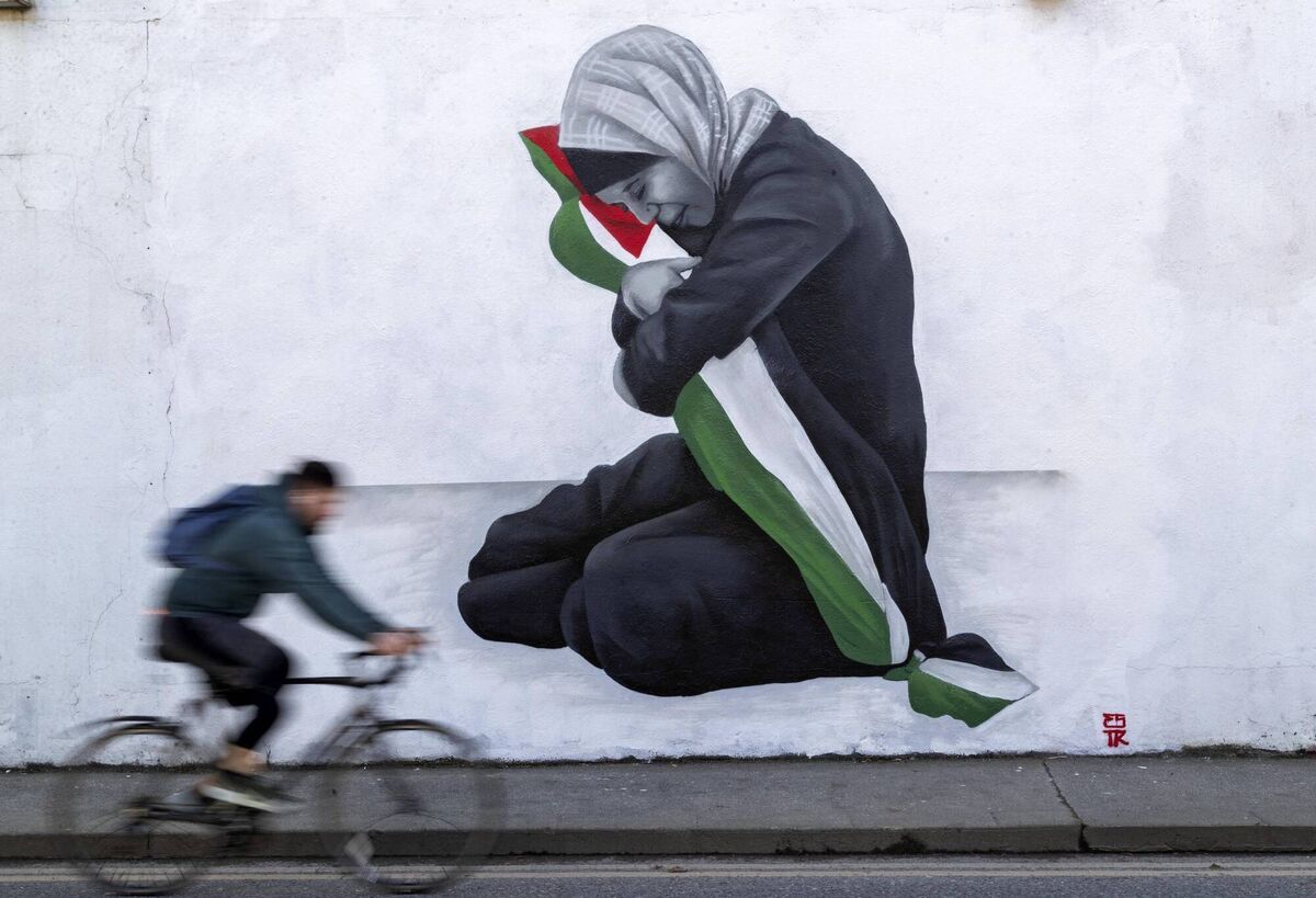 The photo of Samia al-Atrash cradling her niece's remains was carried by media all over the world last October. The following month, Emmalene Blake created this mural in the Harold's Cross area of Dublin. Picture: Colin Keegan/Collins