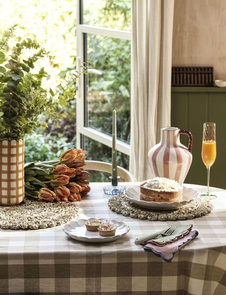  The Marks &amp; Spencer vase range for displaying garden blooms includes the Kirsten ceramic check vase, €22, and the striped jug vase, €28.