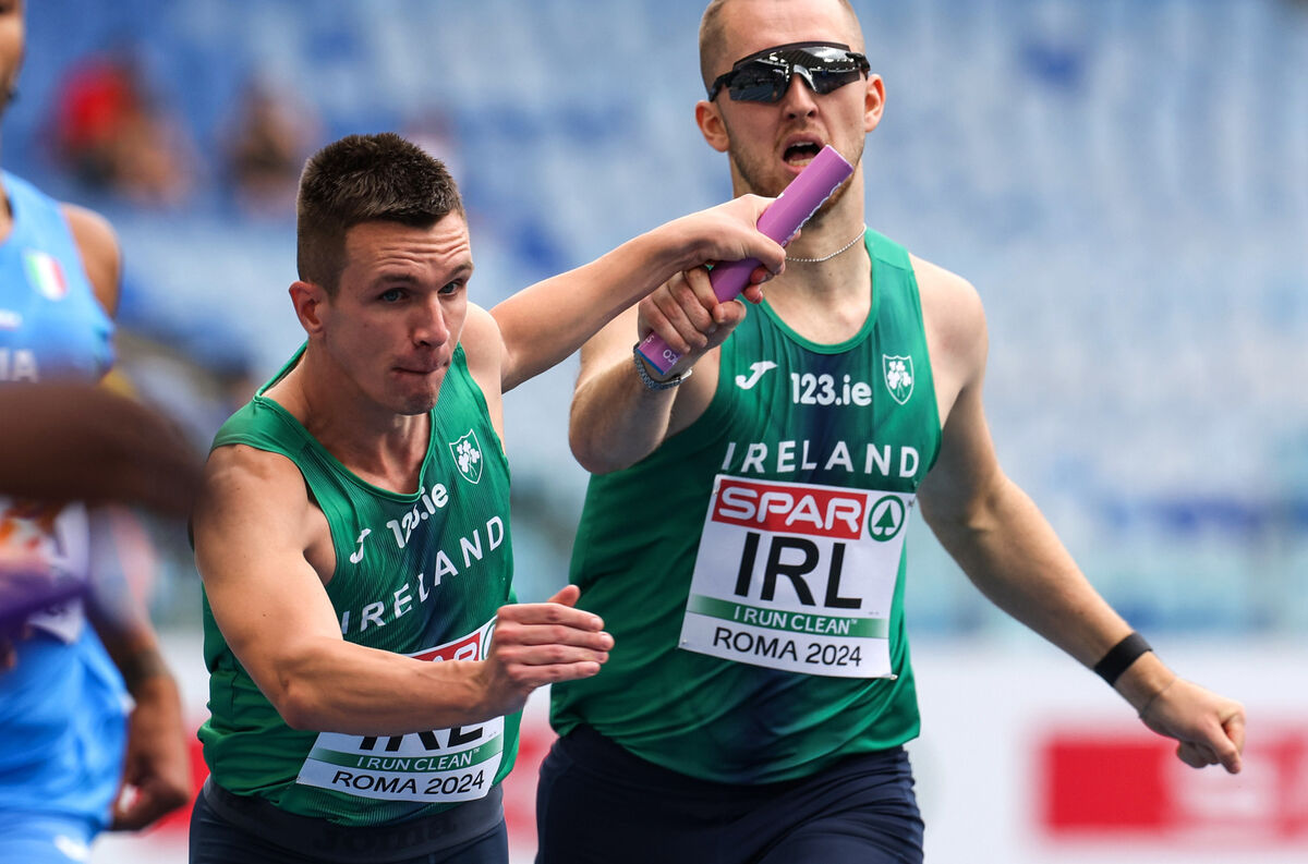 Jack Rafter passes the baton to Chris O’Donnell in the men’s 4x400m relay at the European Athletics Championships, Stadio Olympico, Rome. Picture: Morgan Treacy/Inpho