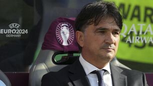 <p>MORE RESPECT: Croatia's head coach Zlatko Dalic sits on the bench before a Group B match between Spain and Croatia. AP Photo/Sunday Alamba.</p>