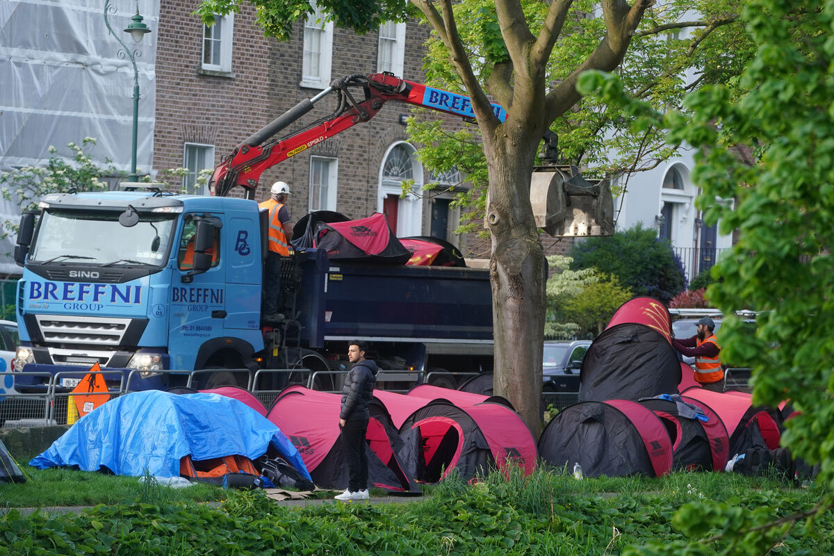 An early morning operation to remove asylum seeker tents along a stretch of the Grand Canal in Dublin last month. The labelling of the tented community as ‘shanty towns’, is part of who we are. File photo An early morning operation to remove asylum seeker tents along a stretch of the Grand Canal in Dublin last month. The labelling of the tented community as ‘shanty towns’, is part of who we are. File photo