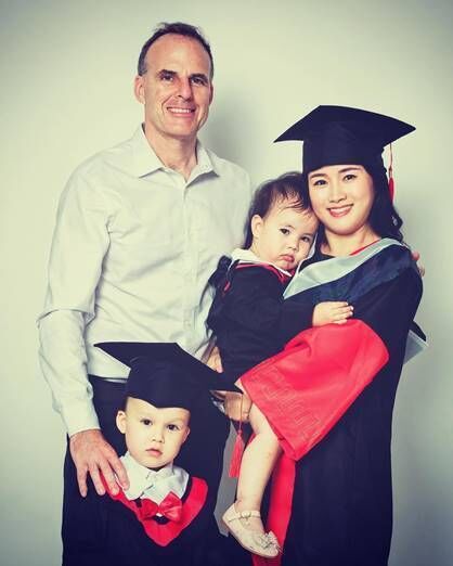 Barry McFarlane with Zoe and their children celebrating receiving her PHD in Epidemiology 2022. 