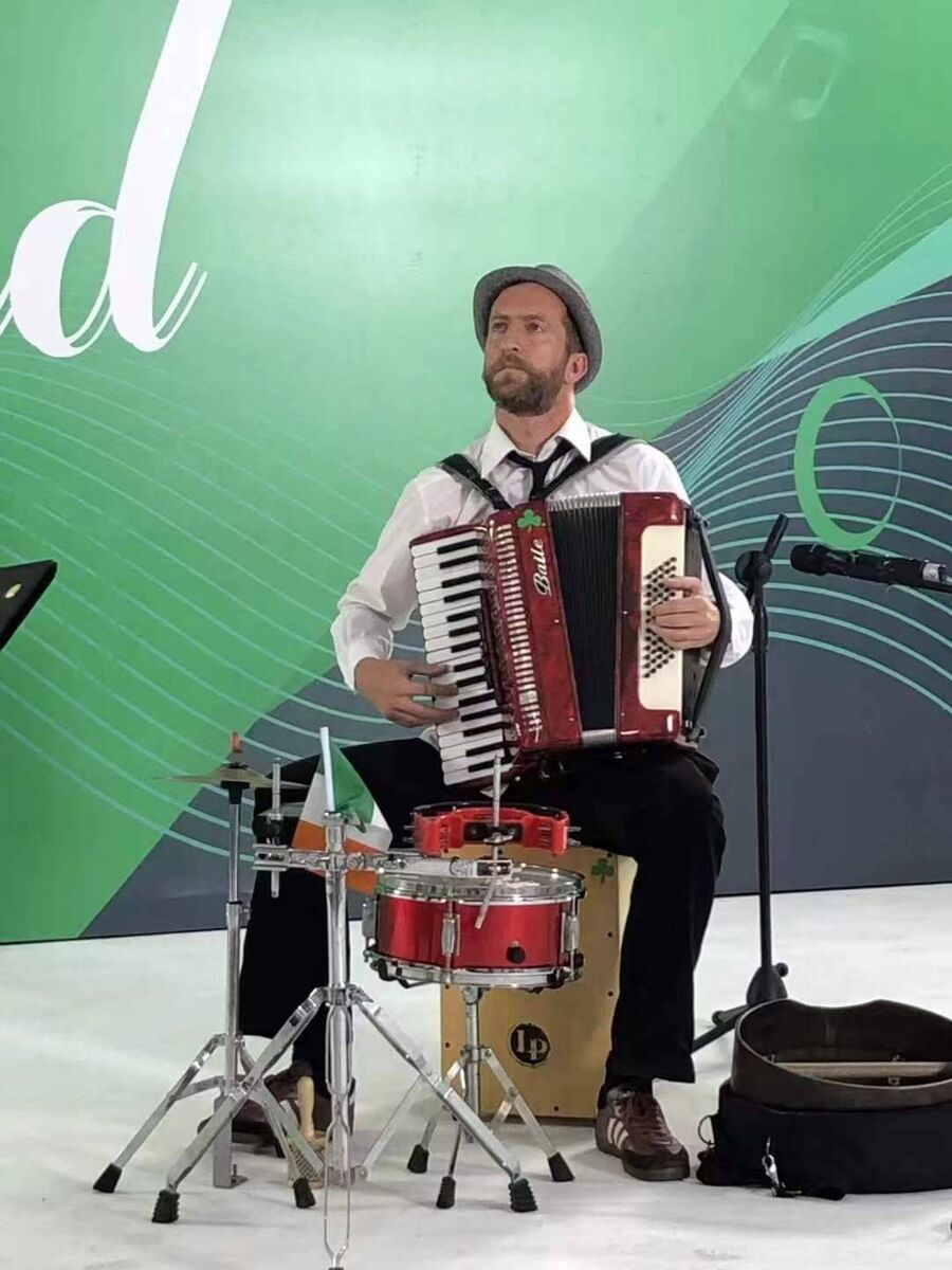 Enda Meade playing a selection of instruments while competing in a Battle of the Bands competition in Shanghai. Enda Meade playing a selection of instruments while competing in a Battle of the Bands competition in Shanghai.