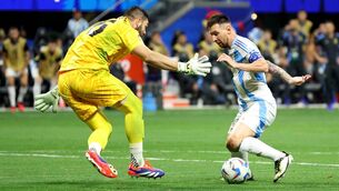 <p>SIDESTEP: Canada keeper Maxime Crepeau is sent for a hot dog by Lionel Messi in Thursday night's Copa America clash in Atlanta. Pic: Todd Kirkland/Getty Images)</p>