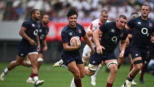 <p>England's Marcus Smith runs to score a try against Japan. Picture: Photo by PHILIP FONG/AFP via Getty Images</p>