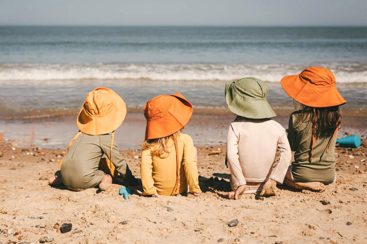 We Are Goose swimsuits and hats