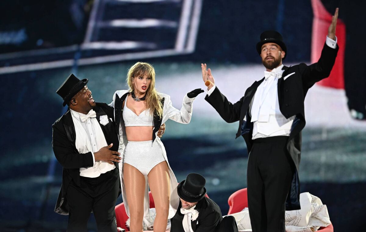 Taylor Swift is joined on stage by Travis Kelce at one of her shows at Wembley Stadium. Picture: Gareth Cattermole/TAS24/Getty Images
