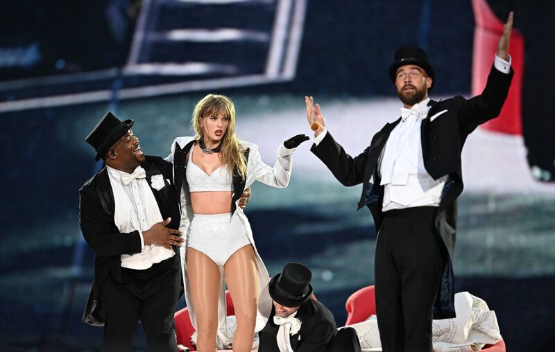 Taylor Swift is joined on stage by Travis Kelce (R), during the Eras Tour at Wembley Stadium. Picture: Gareth Cattermole/Getty Images 