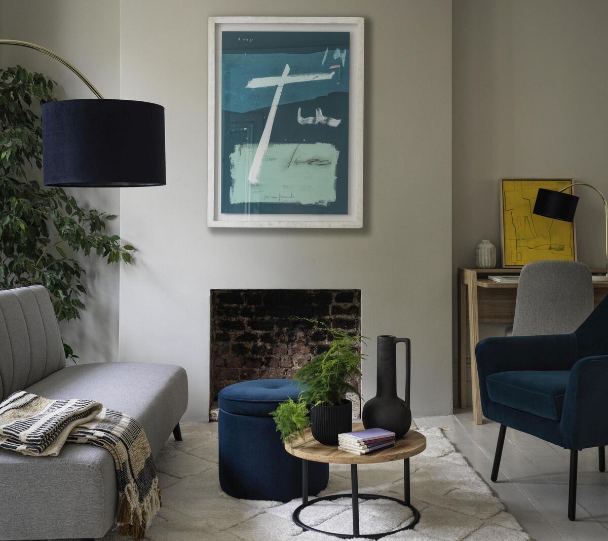  Where once there was a fire place, the remaining aperture can be used for candles and plants or form a backdrop to a styled coffee table. Picture: M&amp;S