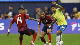 <p>NO WAY THROUGH: Costa Rica'S Ariel Lassiter challenges for the ball with Brazil's Savinho at SoFi Stadium. Pic: Buda Mendes/Getty Images)</p>