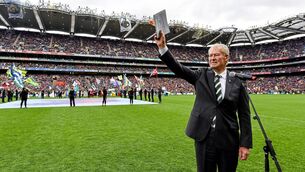<p>Mícheál Ó Muircheartaigh waves to the crowd after a reading during the Laochra entertainment performance after the Allianz Football League final at Croke Park, Dublin, in 2016. Picture: Brendan Moran/Sportsfile</p>