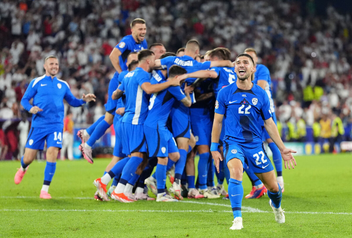 Slovenia's Adam Gnezda Cerin celebrates reaching the round of 16. Photo credit: Adam Davy/PA Wire. Slovenia's Adam Gnezda Cerin celebrates reaching the round of 16. Photo credit: Adam Davy/PA Wire.