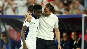 <p>CONSOLATION: Bukayo Saka is embraced by his manager Gareth Southgate after being replaced in the EURO 2024 group game against Slovenia in Cologne. Pic: Richard Pelham/Getty Images</p>