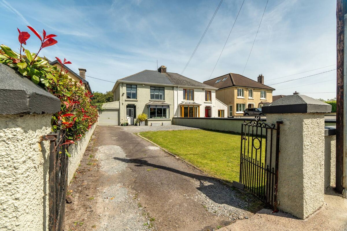 Long front drive and lawn to 3 Bishopstown West