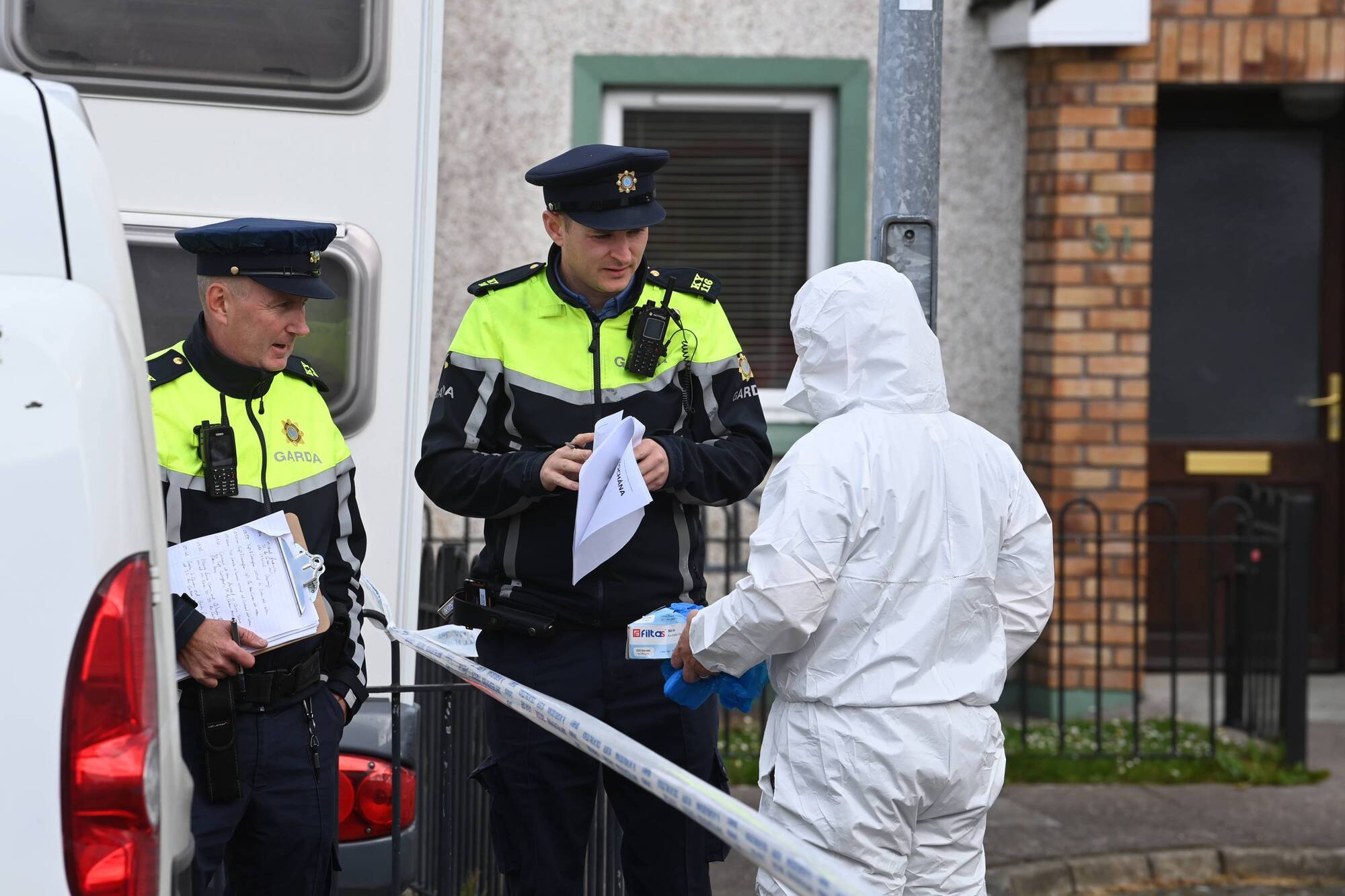 Gardaí at a house at An Caislean Mor, Castleisland, Co Kerry, on Friday morning. 
