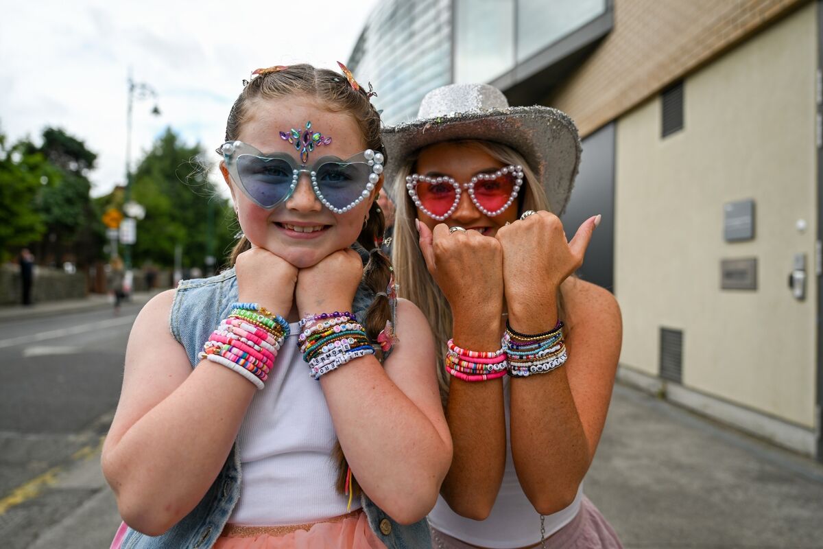 Taylor Swift fans Zara, 7 and Derbhla Mcnamee pictured outside the Aviva for the stars first Dublin concert. Picture Chani Anderson