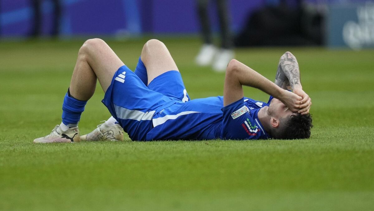 DOWN AND OUT: Italy's Mattia Zaccagni lies on the pitch. Pic: AP Photo/Ariel Schalit) DOWN AND OUT: Italy's Mattia Zaccagni lies on the pitch. Pic: AP Photo/Ariel Schalit)