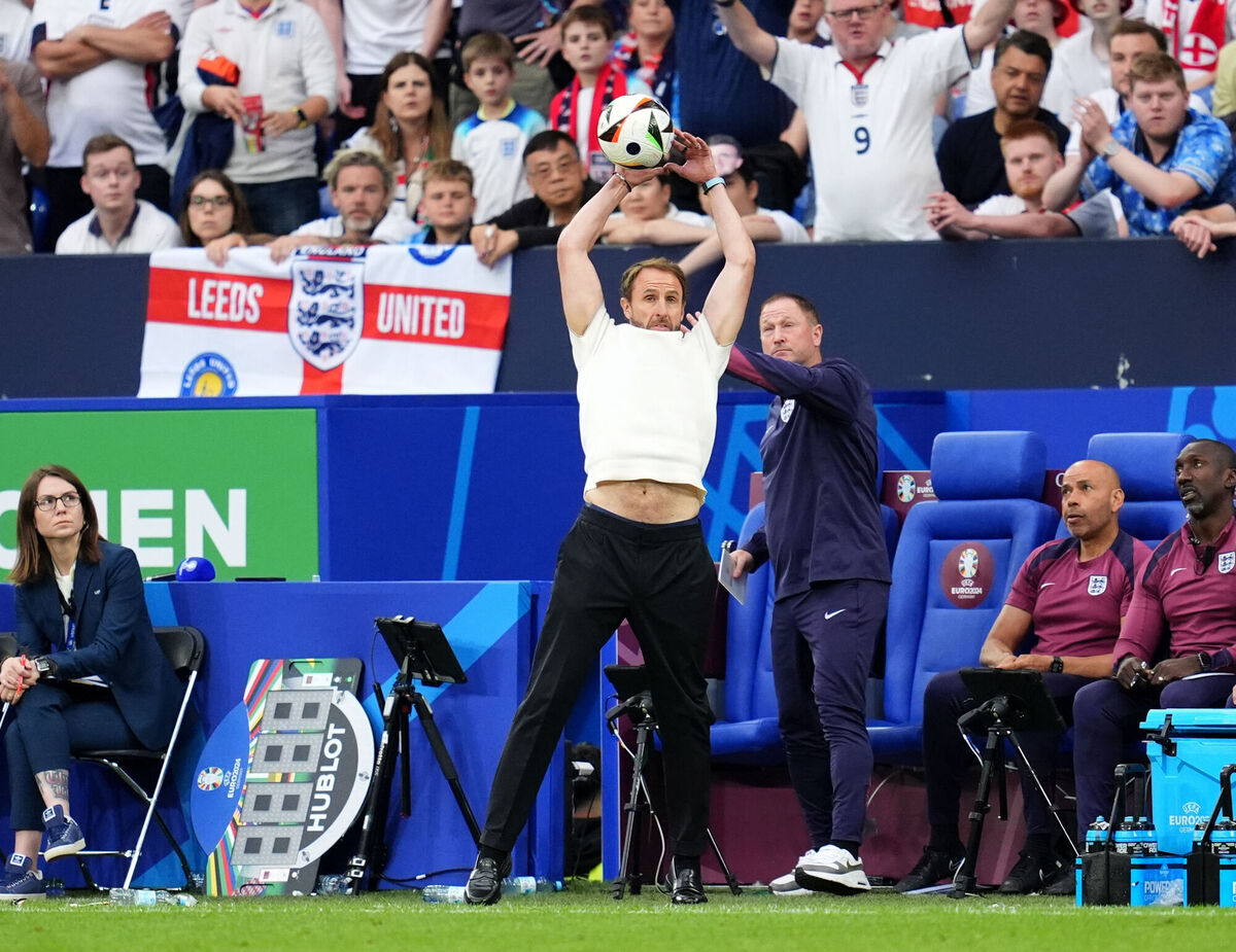 England manager Gareth Southgate catches a high ball on the touchline. Photo credit: Adam Davy/PA Wire.