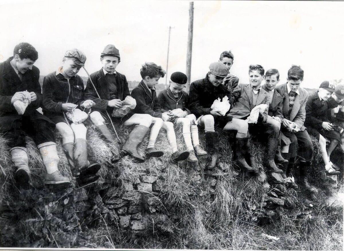 Young Fair Hill Harrier members taking a break in 1956. Left to right: Noel O’Callaghan, Stephen Barrett, John O’Leary, M Good, C Doyle, John Coker, A N Other, Ned Quinlan, R Good, E Healy, N Doyle. Picture: Irish Examiner Archive 